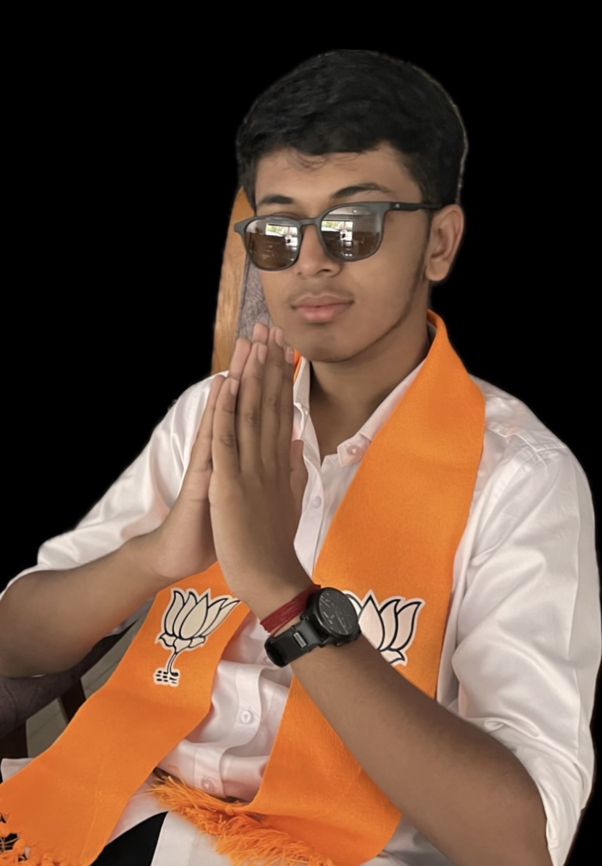 Divyarajsinh in sunglasses with namaskar gesture
